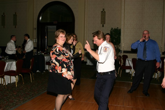 Installation Dinner '08- FF Mackenzie dances while 503 uses his bottle as a microphone